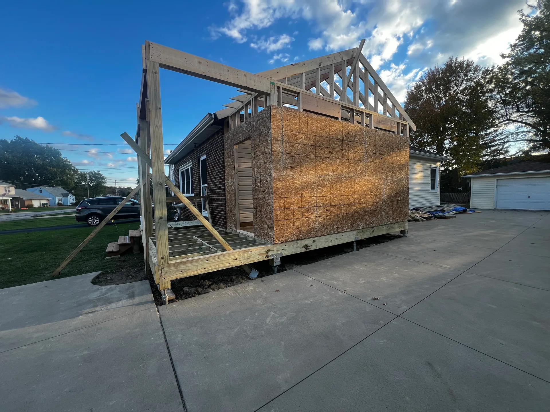 porch addition framing braced posts floor joists detached garage silver springs